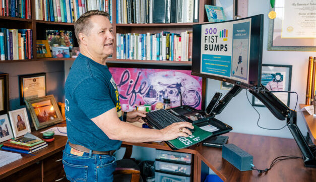 UNCG Professor Creates Well-being Initiative Through Fist Bumps